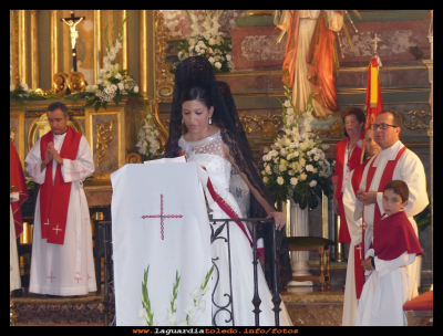 La lectura
La dama de honor Rosana Torres leyendo la lectura de la misa del día 25 del 9 del 2014. 
Keywords: dama  Rosana  misa